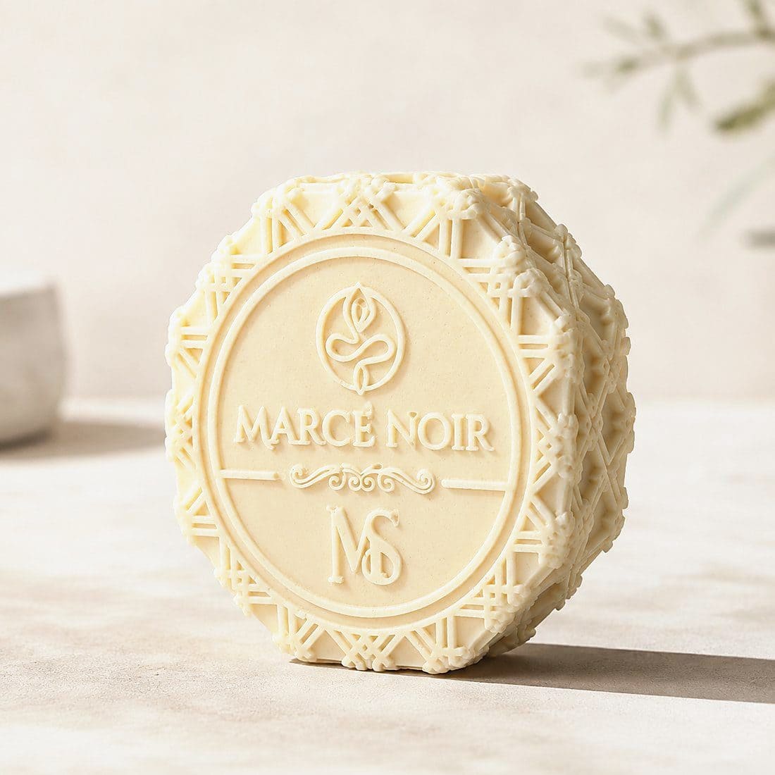 Marcé Noir anti-aging facial soap, engraved octagonal bar — Another side of the piece