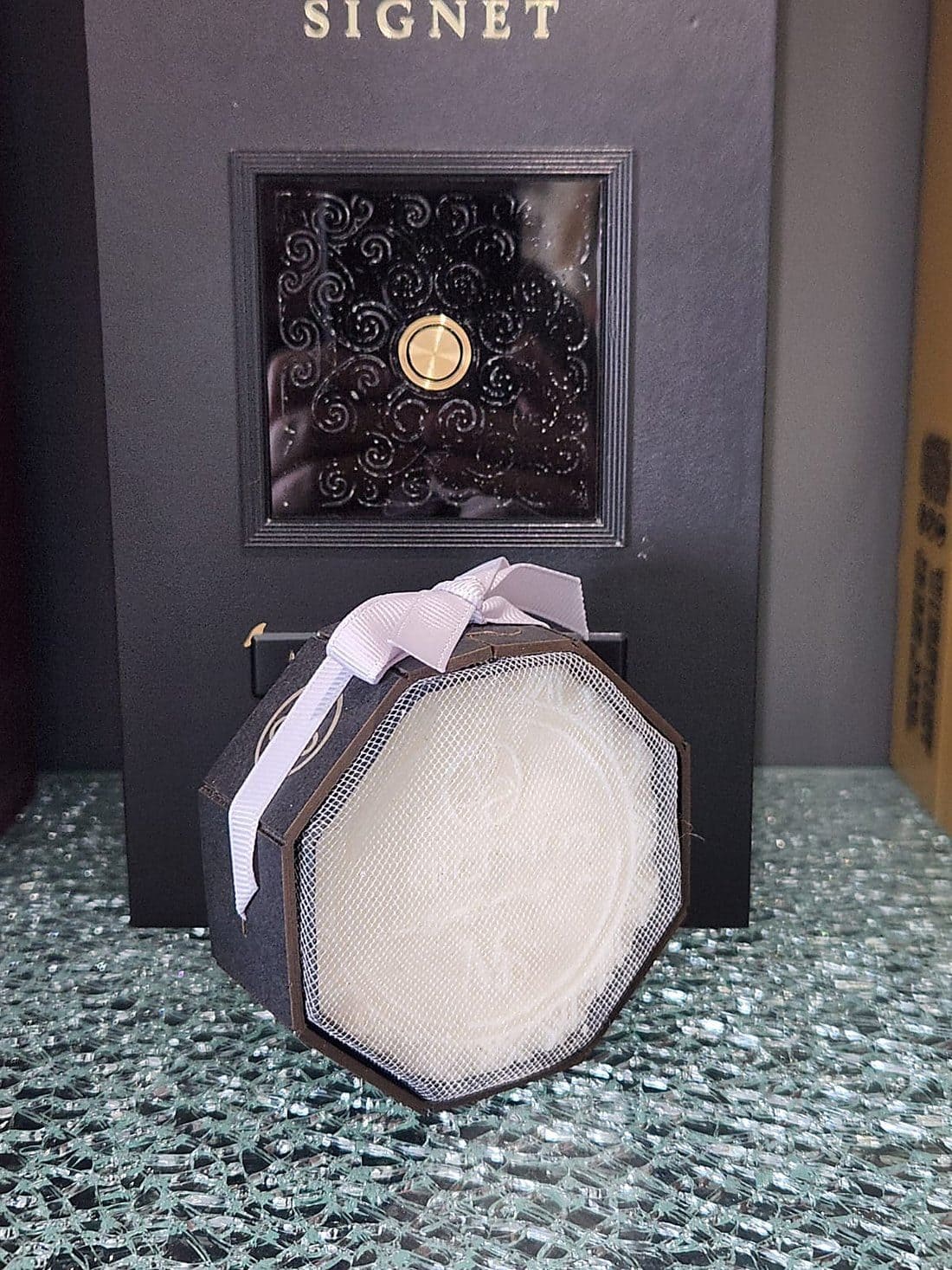 Anti-aging facial soap in its octagonal case